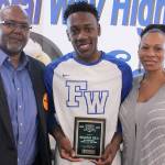 Federal Way Eagles senior center Malcolm Cola was chosen as the 2017 male Federal Way Mirror Athlete of the Year. His teammates and parents, Darnell and Leanne Cola, were on hand for the award presentation. Andy Hobbs, the Mirror