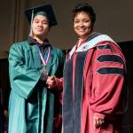 A graduate of the class of 2017 Career Academy at Truman High School poses for a photo with Superintendent Tammy Campbell at the graduation ceremony Saturday at the Tacoma Dome. Photo courtesy Federal Way Public Schools