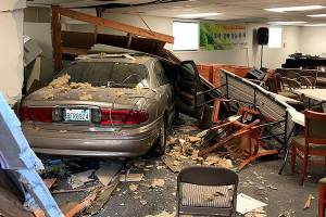 Woman injured after car drives into Federal Way church