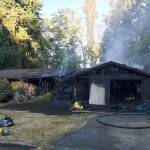 South King Fire & Rescue firefighters extinguished a fire that consumed a home Wednesday morning on Seventh Avenue Southwest in Federal Way. Photo courtesy SKFR