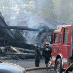A fire overtook Federal Way Auto Wrecking&rsquo;s 2,600-square-foot building Wednesday morning. Courtesy of Shelley Pauls