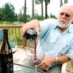 Abbe Vineyard and Winery owner Vilnis Kleper pours a glass of the wine made at the Federal Way estate to guests recently. Kleper and his business partner and sommelier Dainis Svarcs do everything from grow the grapes to bottle the final product at the boutique winery. They would like to open a tasting room on site, but that plan has been stalled while zoning issues are addressed. Andy Hobbs, the Mirror