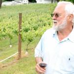 Vilnis Kleper gazes out at his vineyard in Federal Way. Abbe Vineyard and Winery is seeking a permit from the city to open a tasting room. Andy Hobbs, the Mirror