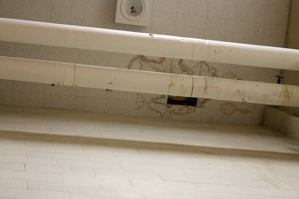The locker rooms and gym at Illahee Middle School is riddled with evident water damage, which has caused locker room lighting to be almost nonexistent. JEROD YOUNG, the Mirror