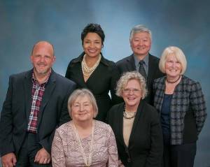 Applicants are sought for the vacant position on the Federal Way Public Schools Board of Education. The new member would replace Liz Drake, pictured far right. Courtesy photo