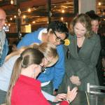 Federal Way Public Schools Superintendent Dr. Tammy Campbell, center, and other district supporters and staff gather to check early election results at a gathering hosted by the Citizens for Federal Way Schools Tuesday at Billy McHale&rsquo;s in Federal Way. As of Wednesday afternoon, the district&rsquo;s $450 million schools bond was no closer to passing. Results in local council races, however, show frontrunners have either maintained their leads or pulled ahead further. JESSICA KELLER, the Mirror
