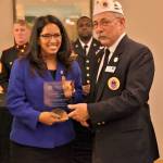 State Rep. Kristine Reeves, D-Federal Way, accepts the 2017 Outstanding Service to Veterans – Legislator of the Year Award from Charles Wharton, chair of the Governors Veterans Affairs Advisory Committee. Photo courtesy Gary Lott, Washington Department of Veterans Affairs
