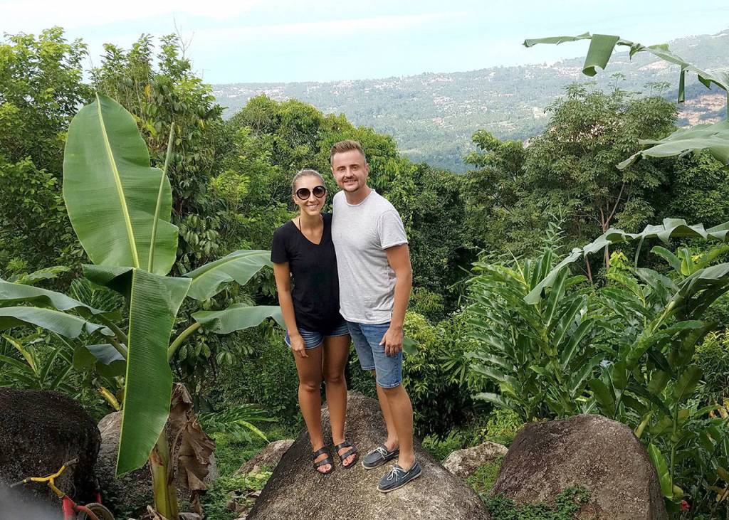 Liana and Alex Borishkevich stand atop a mountain in Koh Samui, Thailand. Courtesy Liana and Alex Borishkevich