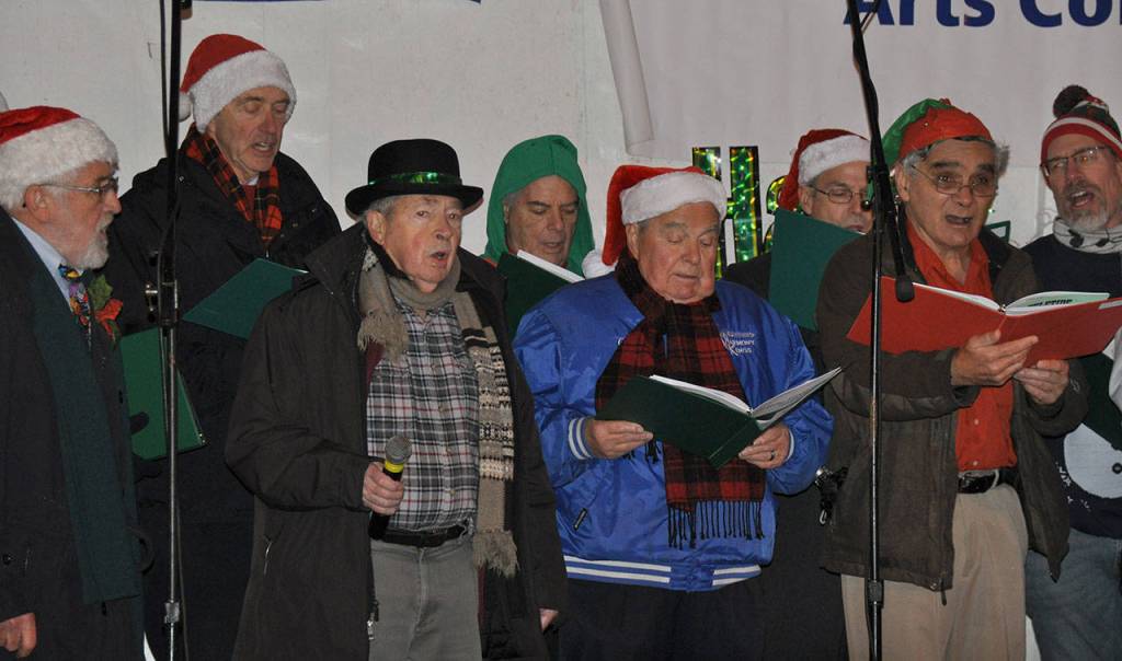 Members of the Harmony Kings perform during the annual tree lighting ceremony last Saturday. Heidi Sanders, the Mirror
