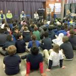 Lions Club presents district third-graders with dictionaries