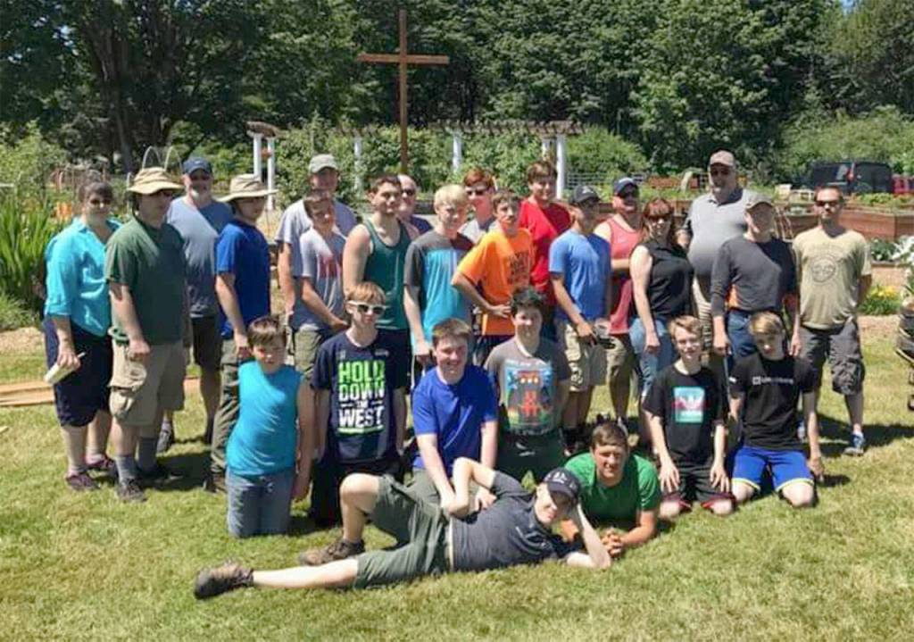 Boy Scout Troop 361 recently worked to improve the Light of Christ Community Garden. Contributed photo