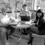 SCORE Mentors Jeff Freedman, from left, and Laurie Heinz sit with Greater Federal Way Chamber of Commerce Member Relations Specialist Asako Fujikura. SCORE and the chamber will be partnering to help small businesses. Courtesy Federal Way Chamber of Commerce