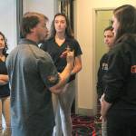 Decatur girls bowling coach Mike David rallies his team after a game 1 loss against Thomas Jefferson Wednesday. While the Gators have not been able to topple the Raiders this season, the young team is still currently sitting in second place in the NPSL Olympic Division as of Wednesday, and David said an eventual win over the Raiders is inevitable. Jessica Keller, the Mirror