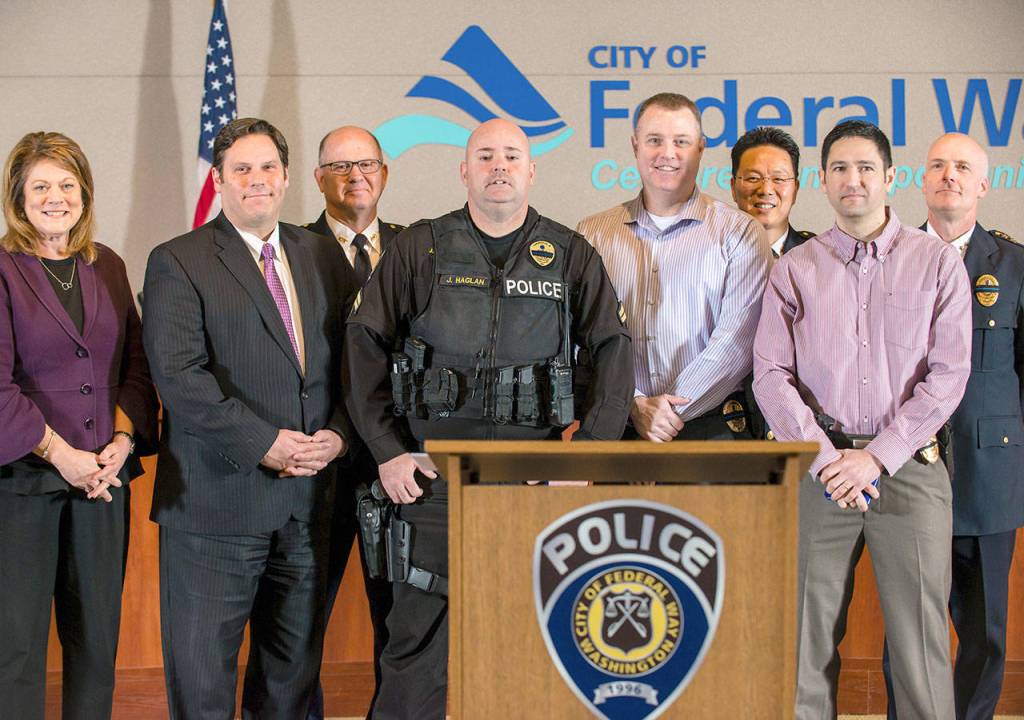 The Federal Way Police Department recently presented Police Chiefs Commendation Awards during its annual awards ceremony. From left are Federal Way Police Department Spokeswoman Cathy Schrock, Mayor Jim Ferrell, Deputy Chief Steve Neal, Cpl. Josh Haglan, Detective Jeff VanderVeer, Chief Andy Hwang, Detective Ray Unsworth and Deputy Chief Kyle Sumpter. Courtesy Federal Way Police Department