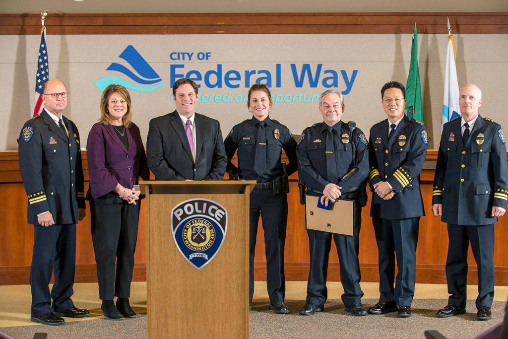The Federal Way Police Department recently presented its annual Life Saving Awards during its annual awards presentation. From left are Deputy Chief Steve Neal, Federal Way Police Department spokeswoman Cathy Schrock, Mayor Jim Ferrell, officer Hillary Brehm, officer Scott Parker, Chief Andy Hwang and Deputy Cheif Kyle Sumpter. Courtesy Federal Way Police Department