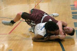 Eagles boys hold off Hornets, secure strong lead atop standings