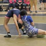 Federal Ways Amanda Henderson bends Decaturs Zekiah Popp into an unnatural position during the all-city girls wrestling meet Wednesday at Decatur. JESSICA KELLER, the Mirror