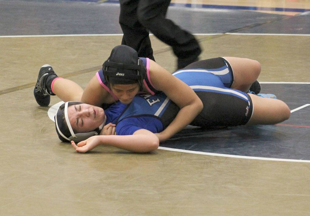Decaturs Jessica Morales gains the upperhand over Federal Ways Giselle Velasco-Soliz in the championship match at the all-city girls wrestling meet Wednesday at Decatur. JESSICA KELLER, the Mirror