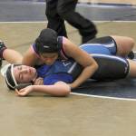 Decaturs Jessica Morales gains the upperhand over Federal Ways Giselle Velasco-Soliz in the championship match at the all-city girls wrestling meet Wednesday at Decatur. JESSICA KELLER, the Mirror