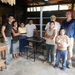 Tom Dirks, right, and Loren Melton, next to Dirks, with a Guatemalan family they installed a new stove for during a mission trip with Marine View Presbyterian Church. Dirks and Melton will return to Guatemala on a similar mission trip in April. Courtesy Brian Dirks