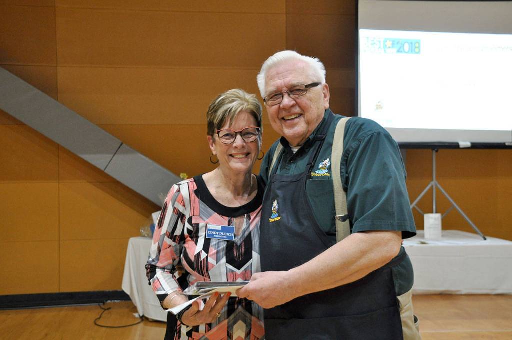 Mirror sales consultant Cindy Ducich, left, and Carl Goretski from The Soggy Doggy, winner of best doggy day care/groomers. Heidi Sanders, the Mirror