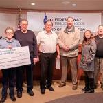 Kiwanis presents check to Federal Way school district