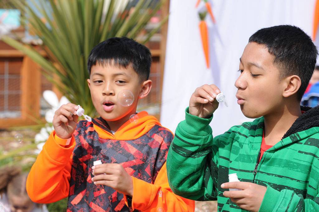 Children hunt for 6,000 eggs at Light of Christ Community Garden