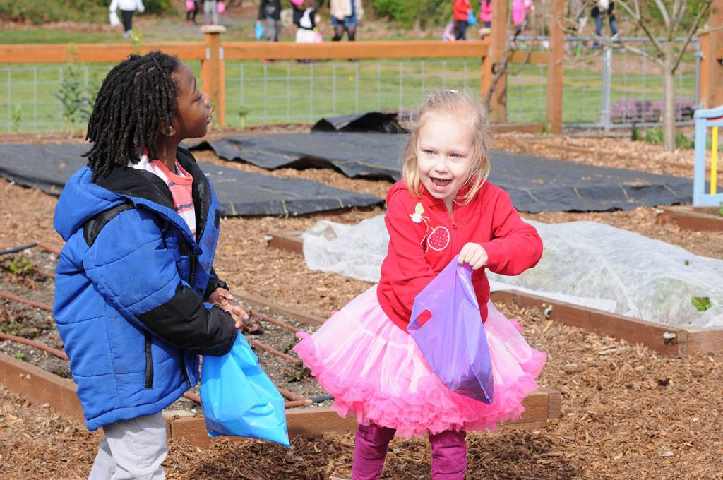 Children hunt for 6,000 eggs at Light of Christ Community Garden