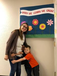 Erin Davenport, a preschool teacher at Brookelake Christian School, gets a hug from students Levi Golden, middle, and Konnor Crawford. Davenport is well-loved by her students. Courtesy photo