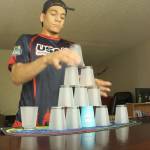 Ezekiel McDowell cycles through one of the stacks that earned him first place at a regional cup-stacking championship in the Northwest. Courtesy Max Wasserman