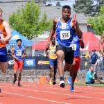 Federal Way High Schools Marcus Eubanks approaches the finish line in the boys 40-by-100-meter relay last Saturday in the state championship track meet. Federal Way won the event and set a school record. RACHEL CIAMPI, the Mirror