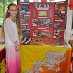 Lydia Totey shows off her display about Bhutan during Federal Way Public Academys Culture Fair in 2017. Courtesy photo