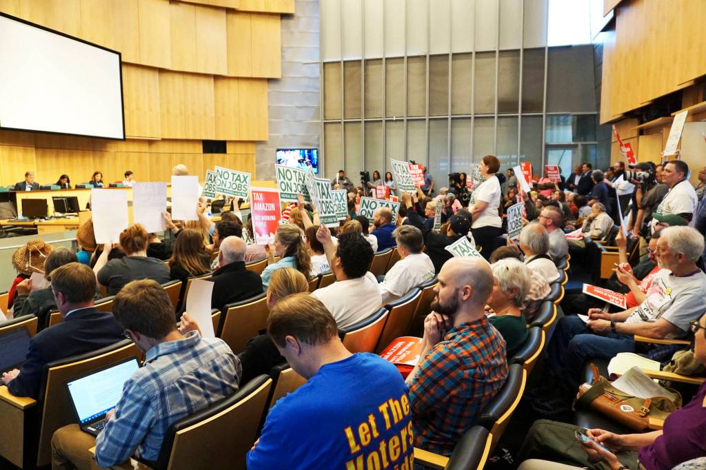 The public awaits the commencement of the special meeting on the head tax. Photo by Melissa Hellmann