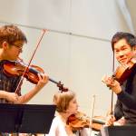 James Garlick, left, and Richard ONeill, here rehearsing for a 2017 Port Angeles Symphony concert, are artistic directors of the new Music on the Strait festival. (Diane Urbani de la Paz/for Peninsula Daily News)