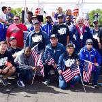 Sharon Boyle, at left, joins local Special Olympics athletes from Federal Way at the June 9 Rise With Us Rally held at the Federal Way Farmers Market. Courtesy Bruce Honda                                Sharon Boyle, at left, joins local Special Olympics athletes from Federal Way at the June 9 Rise With Us Rally held at the Federal Way Farmers Market. Courtesy Bruce Honda