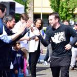 The Federal Way Farmers Market and the City of Federal Way introduced local Special Olympics athletes to the community June 9 at the Rise With Us Rally. Federal Way has 20 residents participating in the 2018 USA Games, which run July 1-6 in the region. Photo by Bruce Honda
