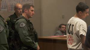 Accompanied by extra King County jail guards, Giovanni D. Herrin appears for his arraignment in King County Superior Court on murder and escape charges. MARK KLAAS, Kent Reporter