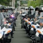 Police motorcyclists line up outside the accesso ShoWare Center on Tuesday. STEVE HUNTER, Kent Reporter
