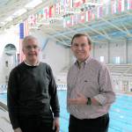King County Councilman Pete von Reichbauer, right, presented a $50,000 grant to the Regional Aquatic Center Coordinator, Mike Dunwiddie, left, for the Weyerhaeuser King County Aquatic Center to enhance visual capabilities in the lobby of the facility. Courtesy photo