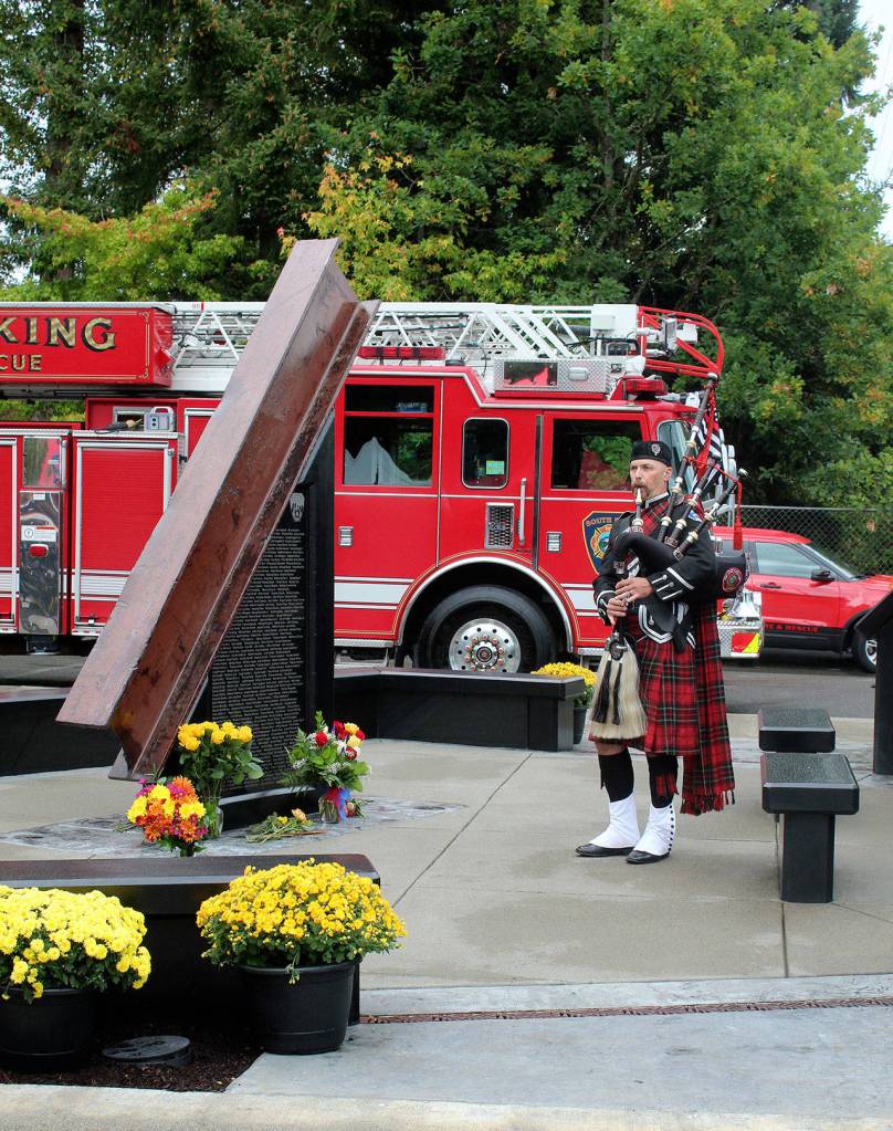 A bagpiper honors those who lost their lives in the 9/11 terrorist attacks. Olivia Sullivan/staff photo