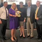 Left to right: Mark Hendricks, Federal Way and Auburn Boys and Girls Club; Jen Cohen, athletic director, University of Washington; Wanda and Ron Crockett; King County Councilmember Pete von Reichbauer. Photo courtesy of King County Council Communications