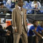 Longtime Federal Way High School basketball coach Jerome Collins reacts during the teams 2016 state championship game. File photo