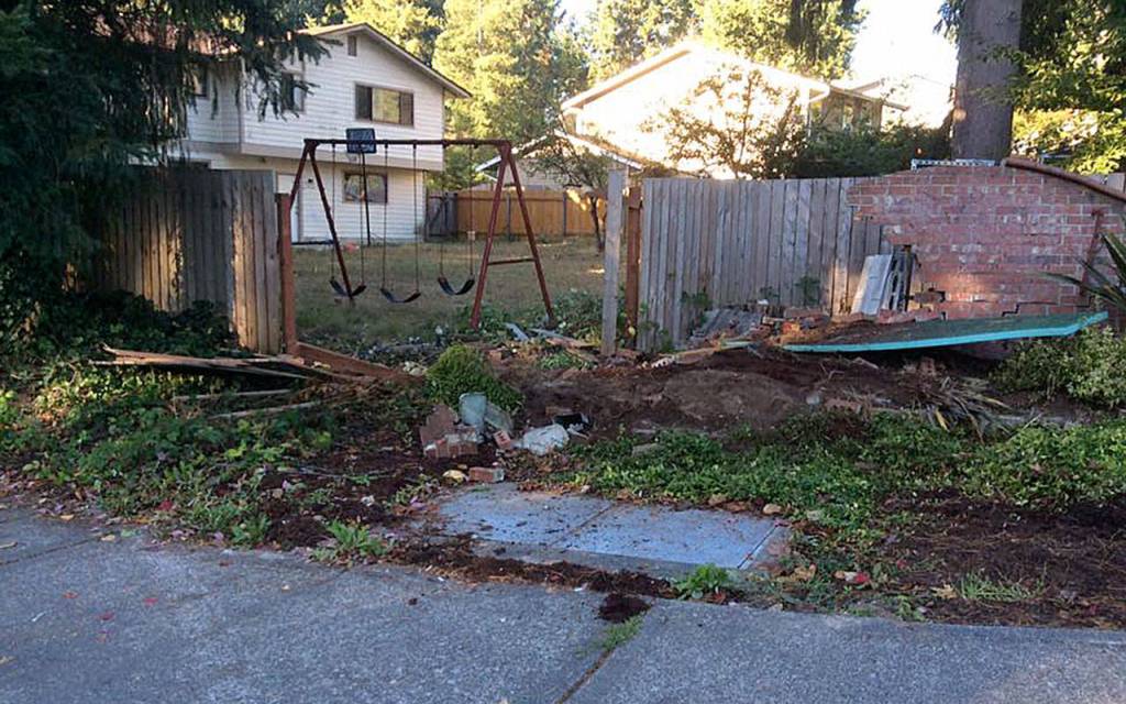 A car crashed into the Campus Woods sign in September 2017, destroying the original monument. Courtesy photo