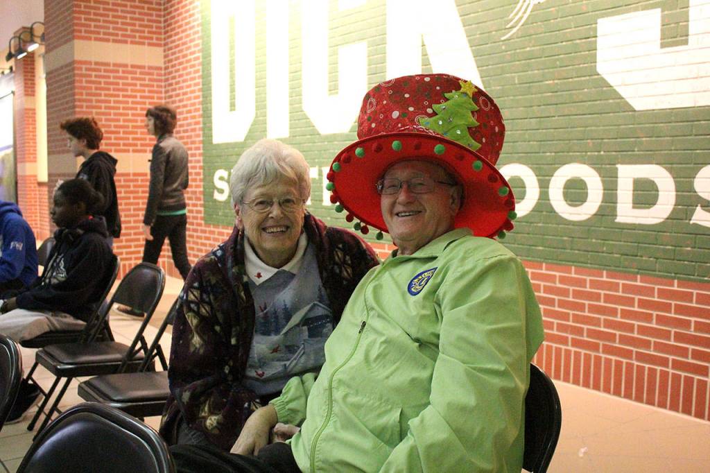 Candy Cane Lane goers in the holiday spirit. Olivia Sullivan/staff photo