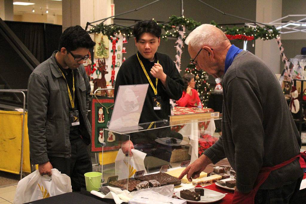 Fudge Works owners Gene and Mary Finney sells various homemade fudge in flavors such as mint swirl, dark chocolate and sea salt, and peanut butter. Olivia Sullivan/staff photo