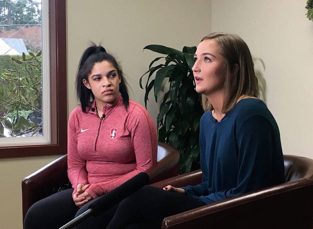 Tally Thomas, left, and Gwen Gabert speak to the media during a press conference at Joan Mells office in Fircrest on Wednesday afternoon. Olivia Sullivan/staff photo