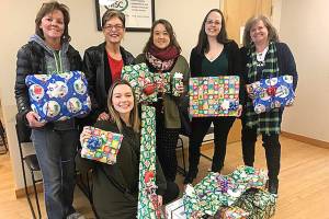 Mirror donates holiday gifts to family in need