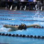 A Decatur swimmer powers through the water during the 100-yard butterfly. Olivia Sullivan/staff photo