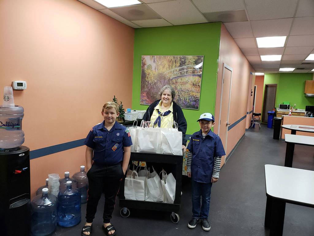 Cub Scouts provide scarfs, items for homeless in Federal Way