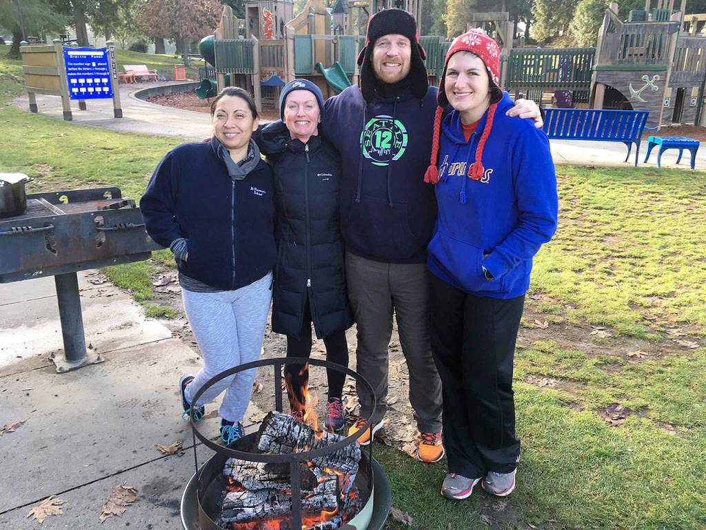 Ted Colby, second from right, founded the Steel Lake event, this year deemed the Frozen Fishy 5K and Polar Dip. Courtesy photo